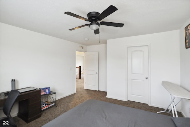 bedroom featuring a ceiling fan, carpet flooring, visible vents, and baseboards