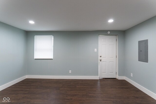 238-240 N Beville Ave, Indianapolis, IN 46201 - empty room with electric panel, baseboards, dark wood-style flooring, and recessed lighting