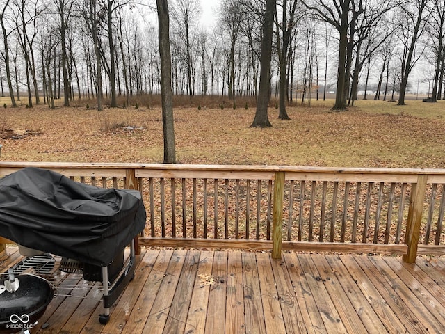 wooden terrace with area for grilling