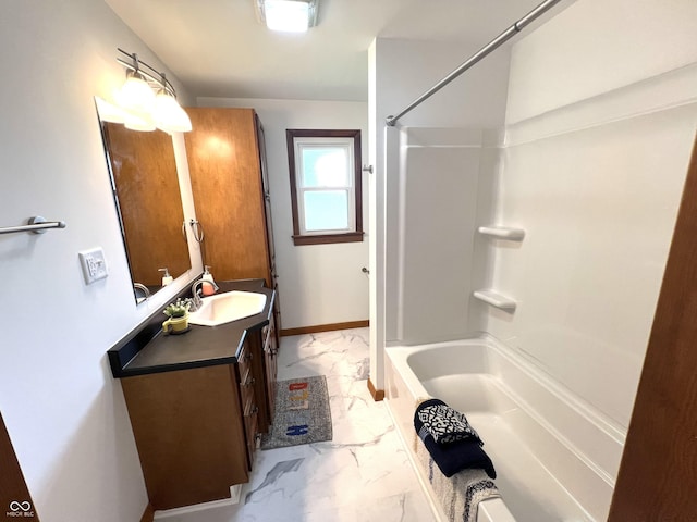 662 S County Road 150 W, Greensburg, IN 47240 - bathroom with marble look tiles, vanity, and shower / tub combination
