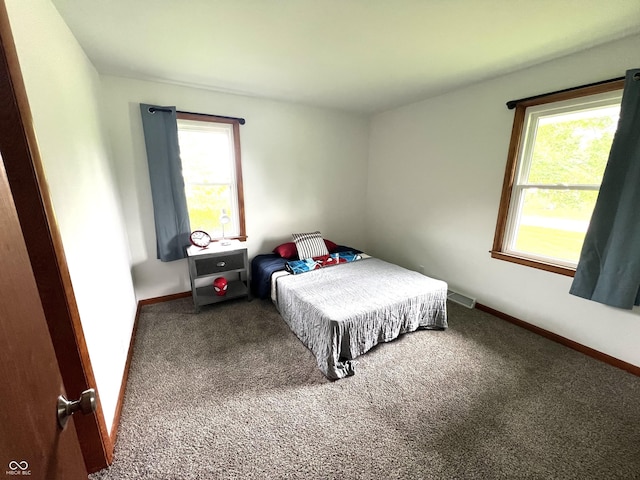 662 S County Road 150 W, Greensburg, IN 47240 - carpeted bedroom with baseboards