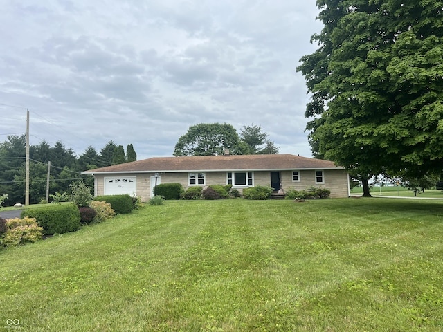 662 S County Road 150 W, Greensburg, IN 47240 - ranch-style home featuring a garage and a front yard