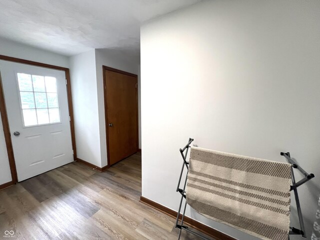 662 S County Road 150 W, Greensburg, IN 47240 - foyer featuring baseboards and light wood-style floors