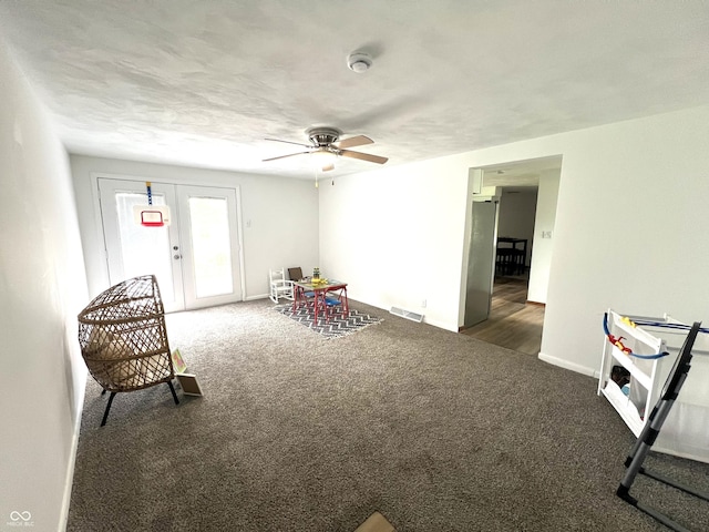 662 S County Road 150 W, Greensburg, IN 47240 - living area with carpet and a ceiling fan