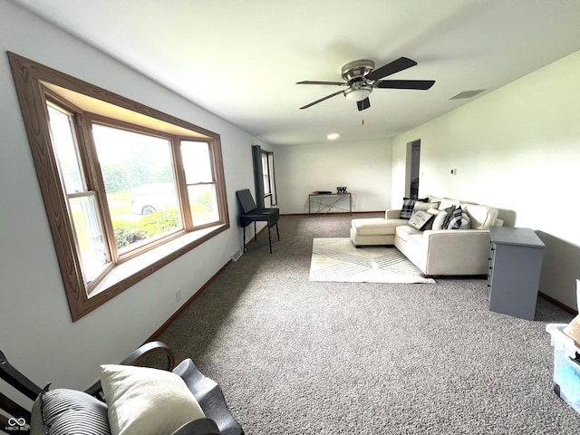 662 S County Road 150 W, Greensburg, IN 47240 - carpeted living area featuring ceiling fan and baseboards
