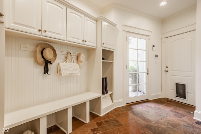 6560 Dawson Lake Dr, Indianapolis, IN 46220 - mudroom with ornamental molding, stone tile flooring, recessed lighting, and baseboards