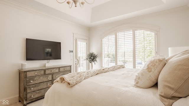 6560 Dawson Lake Dr, Indianapolis, IN 46220 - bedroom featuring multiple windows, access to outside, a tray ceiling, and crown molding