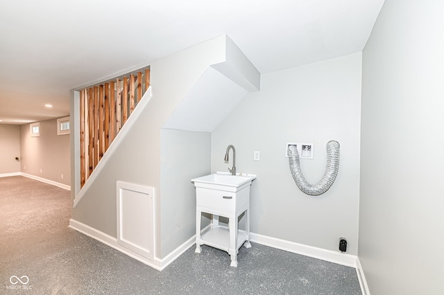 laundry area featuring washer hookup, laundry area, and baseboards