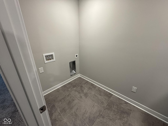 laundry area featuring laundry area, baseboards, washer hookup, and electric dryer hookup