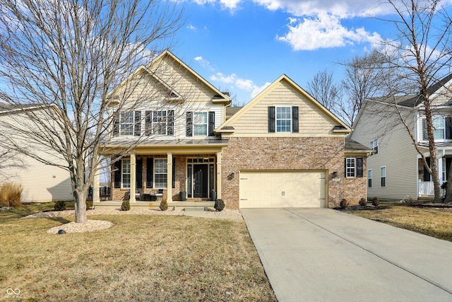 craftsman house featuring a porch, brick siding, driveway, and a front lawn