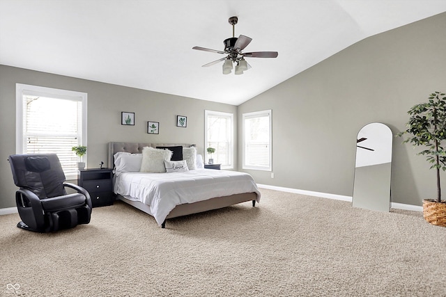 bedroom with carpet floors, multiple windows, and baseboards