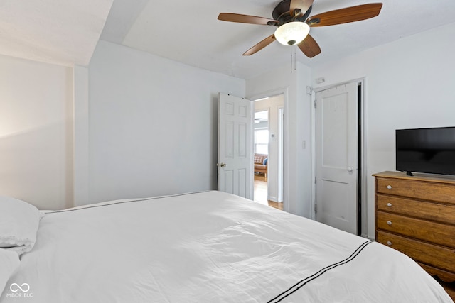 bedroom with a closet and a ceiling fan