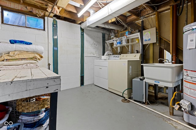 interior space with washer and dryer and a sink