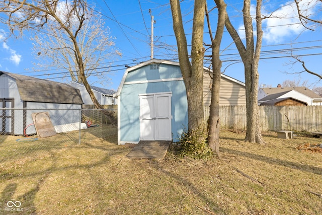 view of shed featuring a fenced backyard