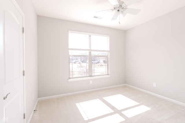 6117 Arctic Cir, Indianapolis, IN 46237 - spare room with light colored carpet, baseboards, and ceiling fan