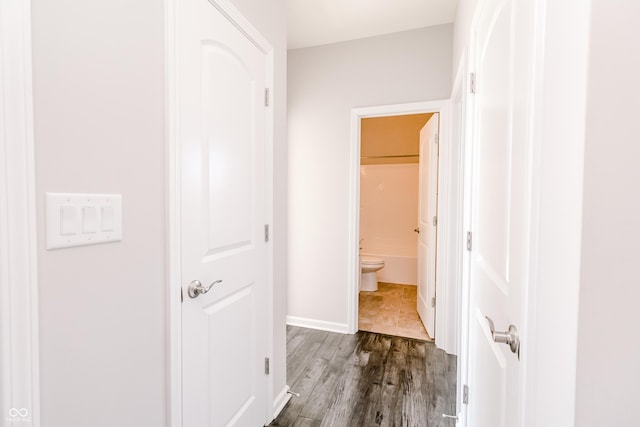 6117 Arctic Cir, Indianapolis, IN 46237 - corridor with dark wood finished floors and baseboards