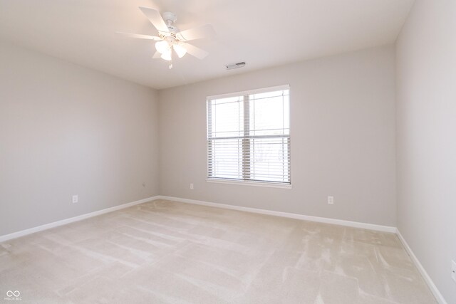 6117 Arctic Cir, Indianapolis, IN 46237 - empty room with light carpet, baseboards, and a ceiling fan
