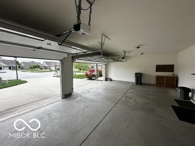 6117 Arctic Cir, Indianapolis, IN 46237 - garage featuring a garage door opener
