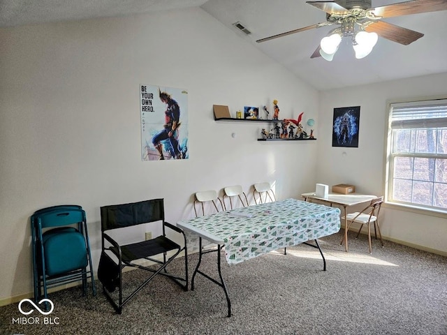 sitting room featuring lofted ceiling, carpet, visible vents, and baseboards