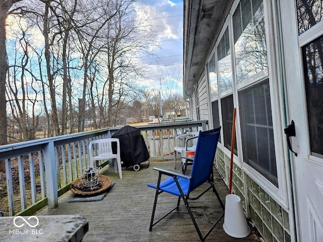 exterior space featuring a deck and area for grilling