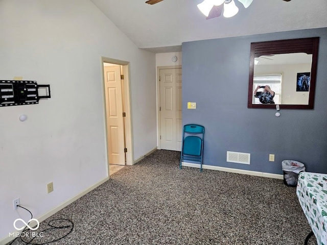 carpeted bedroom featuring vaulted ceiling, ceiling fan, visible vents, and baseboards