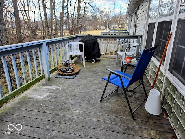 wooden terrace with grilling area