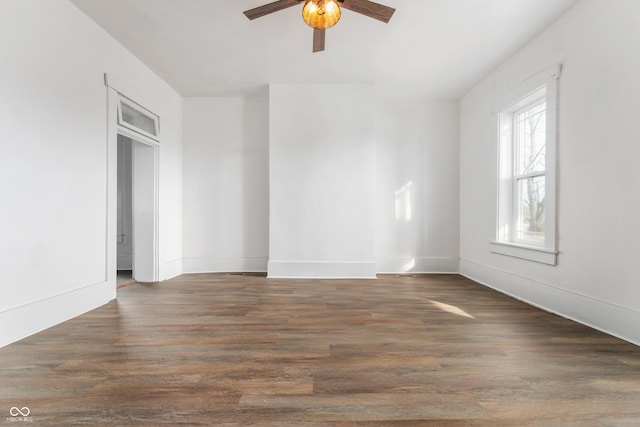 spare room featuring ceiling fan and wood finished floors