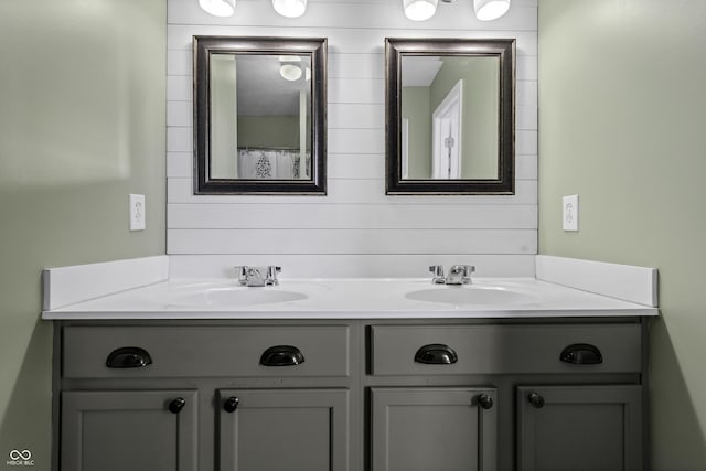 bathroom with double vanity and a sink