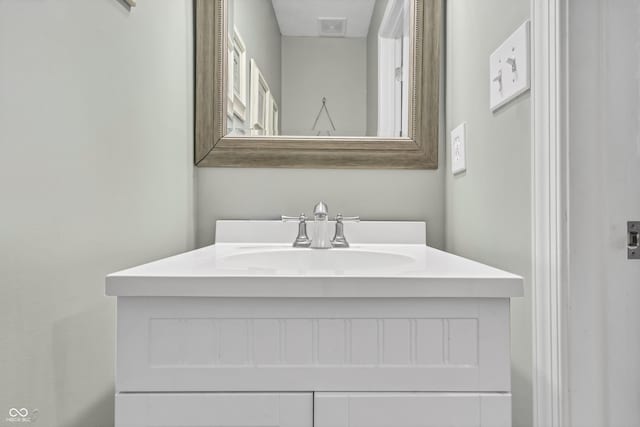 bathroom with visible vents and vanity