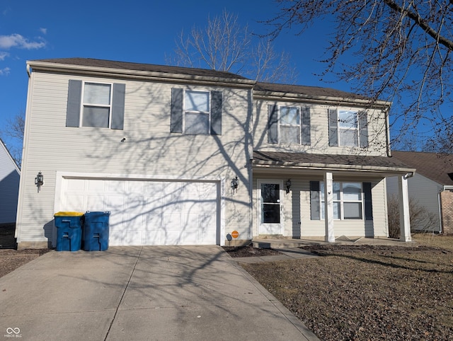 view of front of home featuring a garage, concrete driveway, and a porch