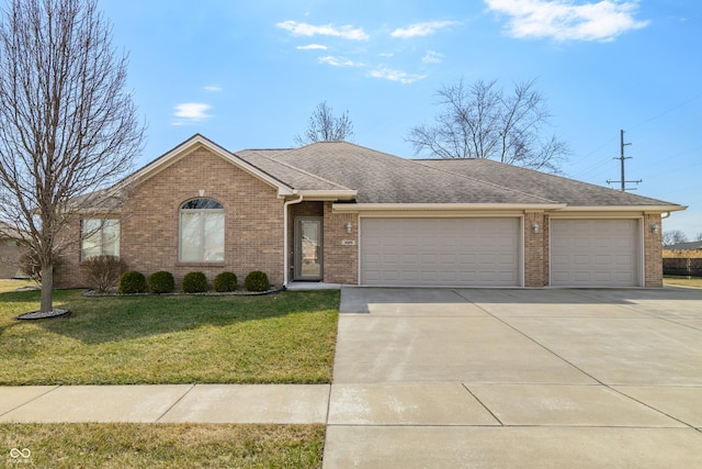 ranch-style home featuring an attached garage, brick siding, driveway, roof with shingles, and a front lawn