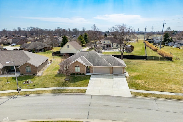 birds eye view of property with a residential view