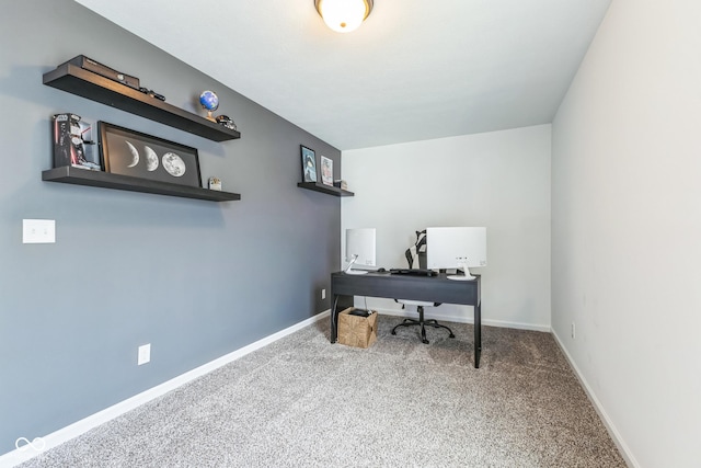 office space with carpet and baseboards