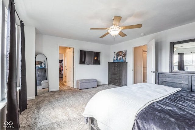 bedroom featuring a ceiling fan, carpet flooring, and baseboards