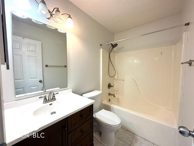 bathroom featuring a textured ceiling, toilet, shower / bath combination, vanity, and tile patterned floors