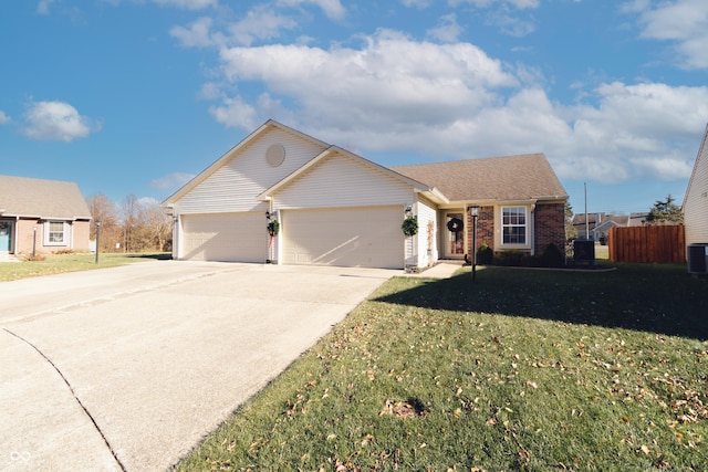 ranch-style home with a garage, driveway, cooling unit, a front yard, and brick siding