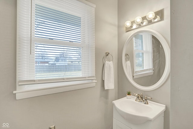 bathroom with a wealth of natural light and vanity