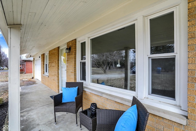 view of patio featuring a porch