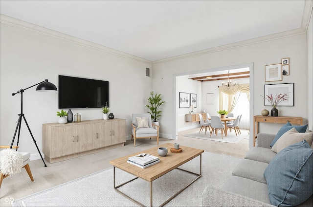 living room featuring ornamental molding, visible vents, baseboards, and an inviting chandelier