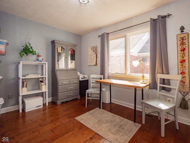 office featuring dark wood finished floors and baseboards