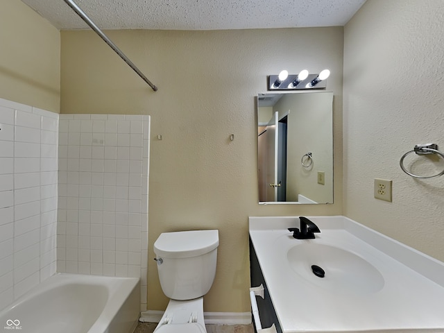 full bathroom with a textured wall, toilet,  shower combination, a textured ceiling, and vanity