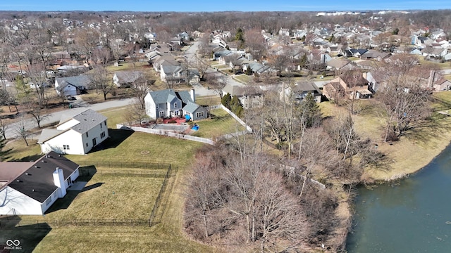 birds eye view of property with a residential view