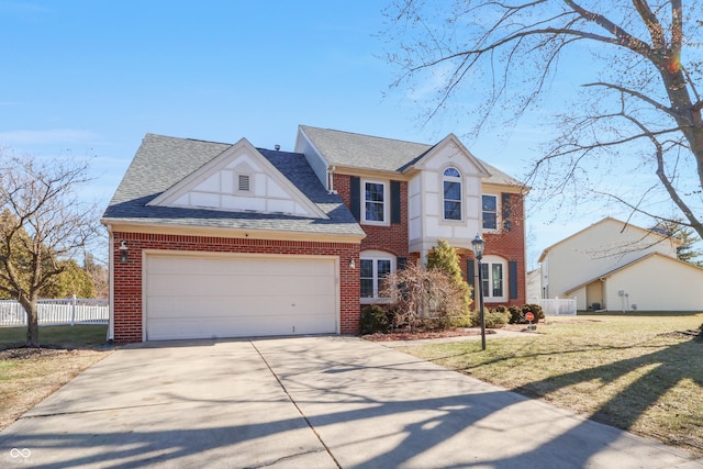 view of front of property with fence, a garage, driveway, and roof with shingles