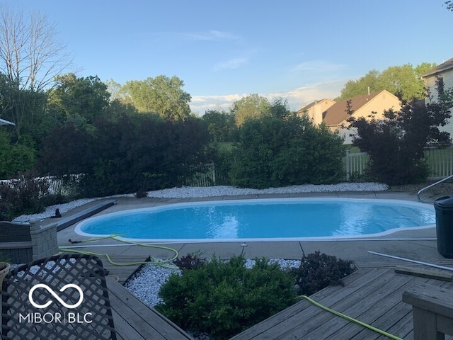 view of pool featuring a fenced in pool and fence