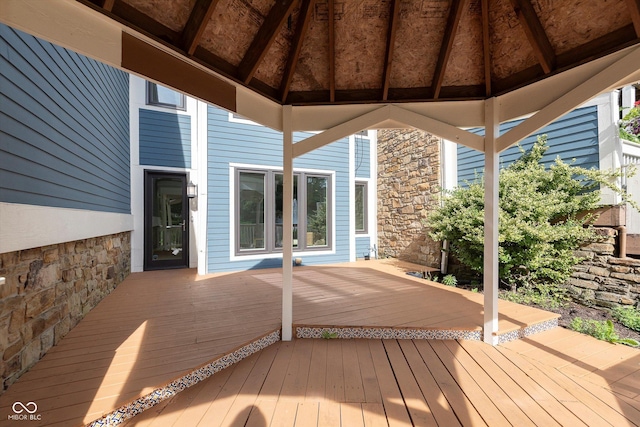 wooden deck featuring a gazebo