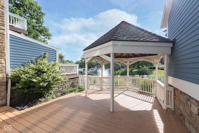 wooden deck with a gazebo