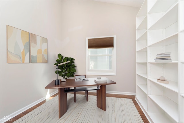 office featuring wood finished floors and baseboards