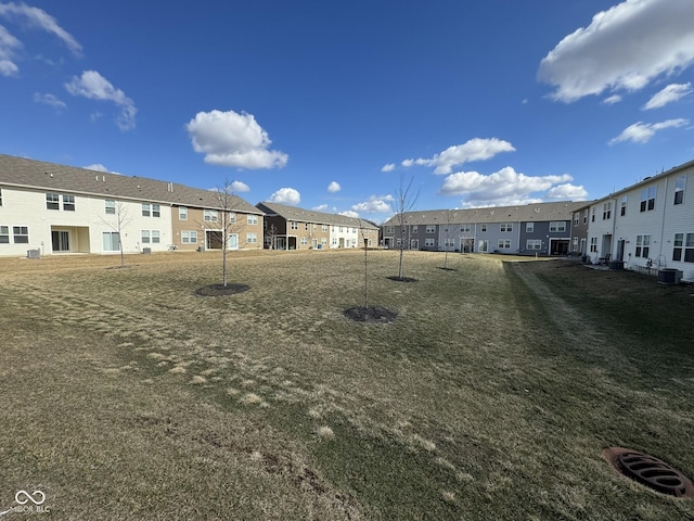 view of yard featuring a residential view