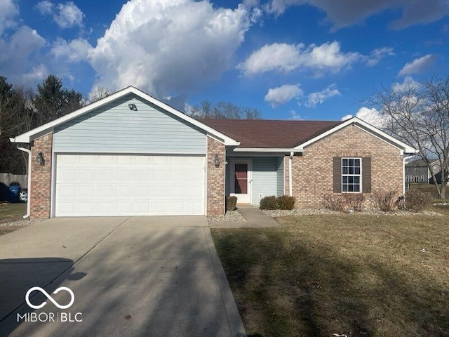 single story home featuring driveway, a garage, a front lawn, and brick siding