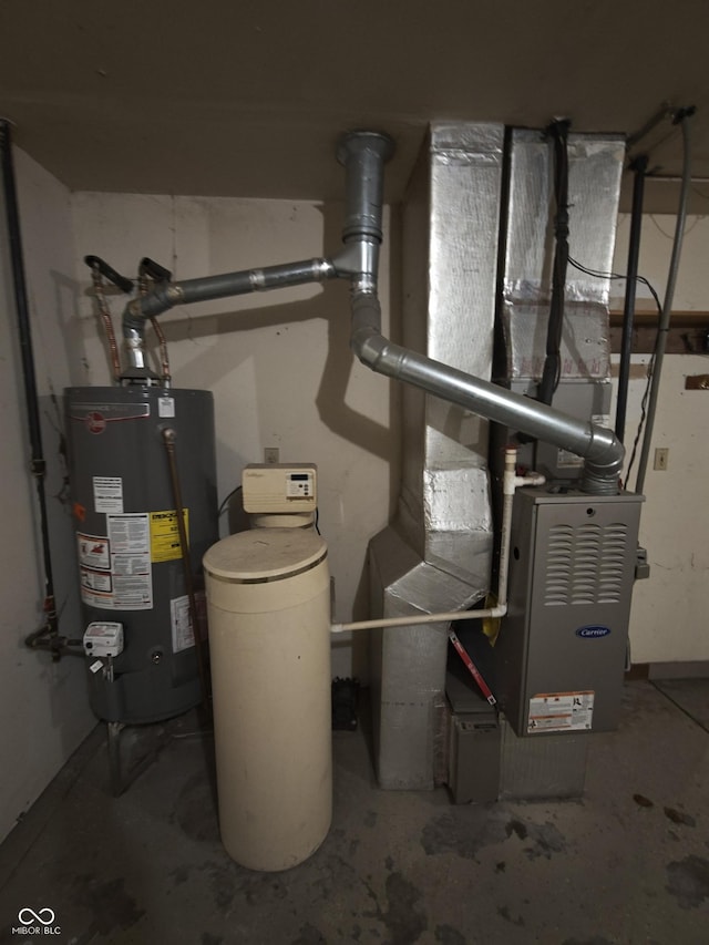 utility room with gas water heater